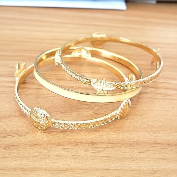 Set of 3 Goldtone Bangle Bracelets Seashells Sand Dollars Two with Cream Enamel - Picture 1 of 8